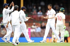 SYDNEY, AUSTRALIA - JANUARY 07: Navdeep Saini of India celebrates with his team after taking the wicket of Will Pucovski of Australia during day one of the Third Test match in the series between Australia and India at Sydney Cricket Ground on January 07, 2021 in Sydney, Australia. (Photo by Mark Kolbe/Getty Images)