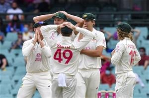 Australian players react after a third umpire decision for not out against India