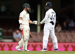 SYDNEY, AUSTRALIA - JANUARY 08: Matthew Wade of Australia check on Hanuma Vihari of India after hitting the ball into him during day two of the 3rd Test match in the series between Australia and India at Sydney Cricket Ground on January 08, 2021 in Sydney, Australia. (Photo by Ryan Pierse/Getty Images)