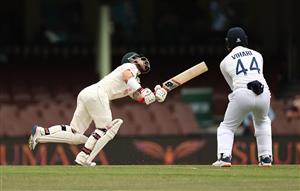 SYDNEY, AUSTRALIA - JANUARY 08: Matthew Wade of Australia hits and his caught by Jasprit Bumrah of India off the bowling of Ravindra Jadeja of India during day two of the 3rd Test match in the series between Australia and India at Sydney Cricket Ground on January 08, 2021 in Sydney, Australia. (Photo by Ryan Pierse/Getty Images)