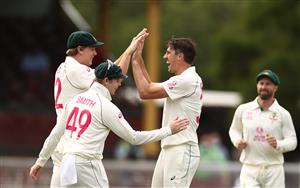 SYDNEY, AUSTRALIA - JANUARY 08: Pat Cummins and Cameron Green of Australia celebrates after taking the wicket of Shubman Gill of India during day two of the 3rd Test match in the series between Australia and India at Sydney Cricket Ground on January 08, 2021 in Sydney, Australia. (Photo by Ryan Pierse/Getty Images)