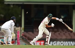 SYDNEY, AUSTRALIA - JANUARY 08: Pat Cummins of Australia is bowled by Ravindra Jadeja of India during day two of the 3rd Test match in the series between Australia and India at Sydney Cricket Ground on January 08, 2021 in Sydney, Australia. (Photo by Ryan Pierse/Getty Images)