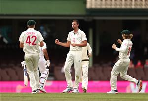 SYDNEY, AUSTRALIA - JANUARY 08: Josh Hazlewood of Australia celebrates after taking a catch to dismiss Rohit Sharma of India off his own bowling during day two of the 3rd Test match in the series between Australia and India at Sydney Cricket Ground on January 08, 2021 in Sydney, Australia. (Photo by Ryan Pierse/Getty Images)