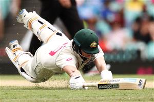 SYDNEY, AUSTRALIA - JANUARY 08: Steve Smith of Australia is runout by Ravindra Jadeja of India during day two of the Third Test match in the series between Australia and India at Sydney Cricket Ground on January 08, 2021 in Sydney, Australia. (Photo by Cameron Spencer/Getty Images)