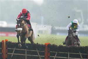 SUNBURY, ENGLAND - JANUARY 09: Harry Cobden riding Barbados Buck's clear the last to win The Play Ladbrokes 1-2-Free On Football Novices' Hurdle at Kempton Park Racecourse on January 09, 2021 in Sunbury, England. Due to the Coronavirus pandemic, owners along with the paying public will not be allowed to attend the meeting. (Photo by Alan Crowhurst/Getty Images)