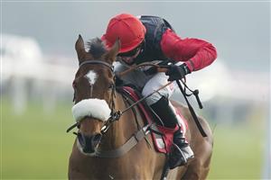 SUNBURY, ENGLAND - JANUARY 09: Harry Cobden riding Barbados Buck's clear the last to win The Play Ladbrokes 1-2-Free On Football Novices' Hurdle at Kempton Park Racecourse on January 09, 2021 in Sunbury, England. Due to the Coronavirus pandemic, owners along with the paying public will not be allowed to attend the meeting. (Photo by Alan Crowhurst/Getty Images)