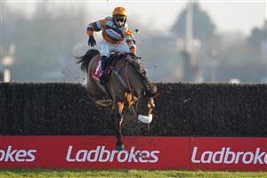 SUNBURY, ENGLAND - JANUARY 09: Harry Cobden riding Master Tommytucker smash through the last fence but remain upright to win The Ladbrokes Silviniaco Conti Chase at Kempton Park Racecourse on January 09, 2021 in Sunbury, England. Due to the Coronavirus pandemic, owners along with the paying public will not be allowed to attend the meeting. (Photo by Alan Crowhurst/Getty Images)