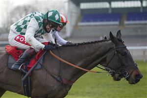 SUNBURY, ENGLAND - JANUARY 09: Richard Johnson riding Smarty Wild (L) clear the last to win The Ladbrokes Where The Nation Plays Handicap Chase from Nico de Boinville and Pistol Whipped at Kempton Park Racecourse on January 09, 2021 in Sunbury, England. Due to the Coronavirus pandemic, owners along with the paying public will not be allowed to attend the meeting. (Photo by Alan Crowhurst/Getty Images)
