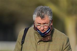 SUNBURY, ENGLAND - JANUARY 09: Trainer Paul Nicholls poses at Kempton Park Racecourse on January 09, 2021 in Sunbury, England. Due to the Coronavirus pandemic, owners along with the paying public will not be allowed to attend the meeting. (Photo by Alan Crowhurst/Getty Images)