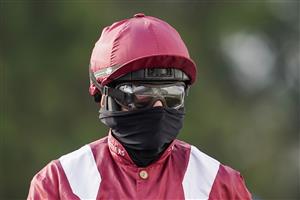 SUNBURY, ENGLAND - JANUARY 09: Sam Twiston-Davies all masked up at Kempton Park Racecourse on January 09, 2021 in Sunbury, England. Due to the Coronavirus pandemic, owners along with the paying public will not be allowed to attend the meeting. (Photo by Alan Crowhurst/Getty Images)