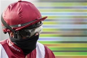 SUNBURY, ENGLAND - JANUARY 09: Sam Twiston-Davies all masked up at Kempton Park Racecourse on January 09, 2021 in Sunbury, England. Due to the Coronavirus pandemic, owners along with the paying public will not be allowed to attend the meeting. (Photo by Alan Crowhurst/Getty Images)
