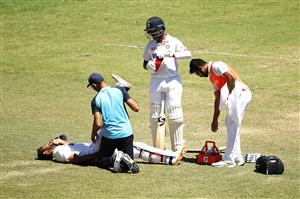 SYDNEY, AUSTRALIA - JANUARY 11: Hanuma Vihari of India receives attention for a leg injury during day five of the Third Test match in the series between Australia and India at Sydney Cricket Ground on January 11, 2021 in Sydney, Australia. (Photo by Mark Kolbe/Getty Images)