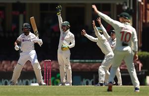 SYDNEY, AUSTRALIA - JANUARY 11: Tim Paine of Australia appeals unsuccessfully for the wicket of Cheteshwar Pujara of India during day five of the 3rd Test match in the series between Australia and India at Sydney Cricket Ground on January 11, 2021 in Sydney, Australia. (Photo by Ryan Pierse/Getty Images)