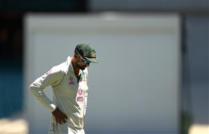 SYDNEY, AUSTRALIA - JANUARY 11: Nathan Lyon of Australia reacts after bowling an over during day five of the 3rd Test match in the series between Australia and India at Sydney Cricket Ground on January 11, 2021 in Sydney, Australia. (Photo by Ryan Pierse/Getty Images)