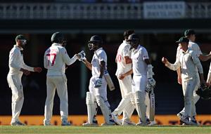 SYDNEY, AUSTRALIA - JANUARY 11: Ravichandran Ashwin and Hanuma Vihari of India are acknowledged by the Australian players after the match ended in a draw during day five of the 3rd Test match in the series between Australia and India at Sydney Cricket Ground on January 11, 2021 in Sydney, Australia. (Photo by Ryan Pierse/Getty Images)