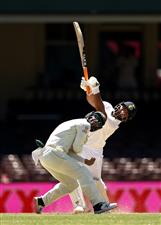 SYDNEY, AUSTRALIA - JANUARY 11: Rishabh Pant of India hits as Matthew Wade of Australia fields and is caught by Pat Cummins of Australia off the bowling of Nathan Lyon of Australia during day five of the 3rd Test match in the series between Australia and India at Sydney Cricket Ground on January 11, 2021 in Sydney, Australia. (Photo by Ryan Pierse/Getty Images)