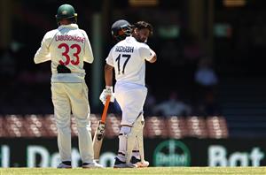 SYDNEY, AUSTRALIA - JANUARY 11: Rishabh Pant of India reacts after being stuck on the helmet during day five of the 3rd Test match in the series between Australia and India at Sydney Cricket Ground on January 11, 2021 in Sydney, Australia. (Photo by Ryan Pierse/Getty Images)