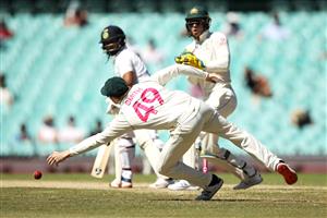SYDNEY, AUSTRALIA - JANUARY 11: Steve Smith of Australia dives for the ball during day five of the Third Test match in the series between Australia and India at Sydney Cricket Ground on January 11, 2021 in Sydney, Australia. (Photo by Mark Kolbe/Getty Images)