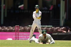 SYDNEY, AUSTRALIA - JANUARY 11: Tim Paine of Australia reacts during day five of the 3rd Test match in the series between Australia and India at Sydney Cricket Ground on January 11, 2021 in Sydney, Australia. (Photo by Ryan Pierse/Getty Images)