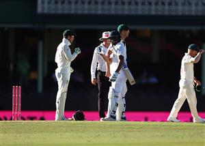 SYDNEY, AUSTRALIA - JANUARY 11: Hanuma Vihari of India and Tim Paine of Australia acknowledge each other after the match ended in a draw during day five of the 3rd Test match in the series between Australia and India at Sydney Cricket Ground on January 11, 2021 in Sydney, Australia. (Photo by Ryan Pierse/Getty Images)