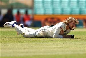 SYDNEY, AUSTRALIA - JANUARY 11: Will Pucovski of Australia dives for the ball and injuries his shoulder during day five of the 3rd Test match in the series between Australia and India at Sydney Cricket Ground on January 11, 2021 in Sydney, Australia. (Photo by Ryan Pierse/Getty Images)