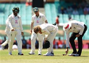 SYDNEY, AUSTRALIA - JANUARY 11: Will Pucovski of Australia reacts after injuring his shoulder during day five of the 3rd Test match in the series between Australia and India at Sydney Cricket Ground on January 11, 2021 in Sydney, Australia. (Photo by Ryan Pierse/Getty Images)