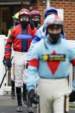 PLUMPTON, ENGLAND - JANUARY 13: A general view as jockeys leave the weighing room at Plumpton Racecourse on January 13, 2021 in Plumpton, England. Due to the Coronavirus pandemic, owners along with the paying public will not be allowed to attend the meeting. (Photo by Alan Crowhurst/Getty Images)