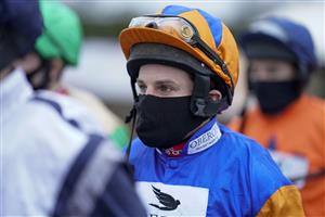 PLUMPTON, ENGLAND - JANUARY 13: Jamie Moore makes his way to the parade ring at Plumpton Racecourse on January 13, 2021 in Plumpton, England. Due to the Coronavirus pandemic, owners along with the paying public will not be allowed to attend the meeting. (Photo by Alan Crowhurst/Getty Images)