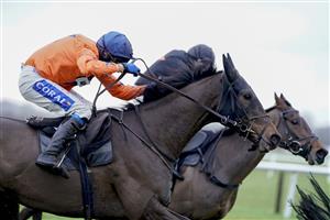PLUMPTON, ENGLAND - JANUARY 13: Tom Scudamore riding Gericault Roque (orange) clear the last to win The Sky Sports Racing Maiden Hurdle (GBB Race) (Div 1) at Plumpton Racecourse on January 13, 2021 in Plumpton, England. Due to the Coronavirus pandemic, owners along with the paying public will not be allowed to attend the meeting. (Photo by Alan Crowhurst/Getty Images)