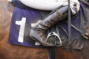 FONTWELL, ENGLAND - JANUARY 14: A wet and muddy day at Fontwell Park Racecourse on January 14, 2021 in Fontwell, England. Due to the Coronavirus pandemic, owners along with the paying public will not be allowed to attend the meeting. (Photo by Alan Crowhurst/Getty Images)