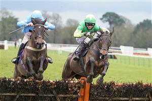FONTWELL, ENGLAND - JANUARY 14: Ben Godfrey riding Lily The Pink (R) clear the last to win The Visit attheraces.com Handicap Hurdle at Fontwell Park Racecourse on January 14, 2021 in Fontwell, England. Due to the Coronavirus pandemic, owners along with the paying public will not be allowed to attend the meeting. (Photo by Alan Crowhurst/Getty Images)