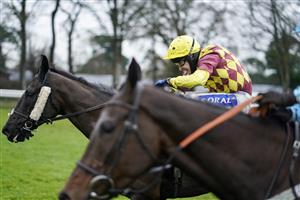 FONTWELL, ENGLAND - JANUARY 14: Tom Scudamore riding Umbrigado (farside) clear the last to win The Subscribe To attheraces On YouTube Novices' Chase at Fontwell Park Racecourse on January 14, 2021 in Fontwell, England. Due to the Coronavirus pandemic, owners along with the paying public will not be allowed to attend the meeting. (Photo by Alan Crowhurst/Getty Images)
