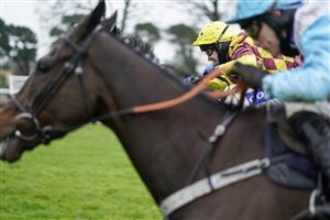 FONTWELL, ENGLAND - JANUARY 14: Tom Scudamore riding Umbrigado (farside) clear the last to win The Subscribe To attheraces On YouTube Novices' Chase at Fontwell Park Racecourse on January 14, 2021 in Fontwell, England. Due to the Coronavirus pandemic, owners along with the paying public will not be allowed to attend the meeting. (Photo by Alan Crowhurst/Getty Images)