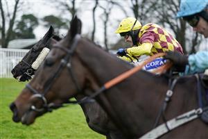 FONTWELL, ENGLAND - JANUARY 14: Tom Scudamore riding Umbrigado (farside) clear the last to win The Subscribe To attheraces On YouTube Novices' Chase at Fontwell Park Racecourse on January 14, 2021 in Fontwell, England. Due to the Coronavirus pandemic, owners along with the paying public will not be allowed to attend the meeting. (Photo by Alan Crowhurst/Getty Images)