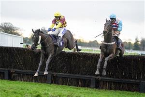 FONTWELL, ENGLAND - JANUARY 14: Tom Scudamore riding Umbrigado (L) clear the last to win The Subscribe To attheraces On YouTube Novices' Chase at Fontwell Park Racecourse on January 14, 2021 in Fontwell, England. Due to the Coronavirus pandemic, owners along with the paying public will not be allowed to attend the meeting. (Photo by Alan Crowhurst/Getty Images)