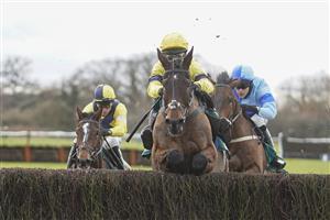 WARWICK, ENGLAND - JANUARY 16: Jonjo O'Neill Jr. riding Sky Pirate (R, yellow) clear the last to win The Edward Courage Cup Handicap Chase at Warwick Racecourse on January 16, 2021 in Warwick, England. Due to the Coronavirus pandemic, owners along with the paying public will not be allowed to attend the meeting. (Photo by Alan Crowhurst/Getty Images)