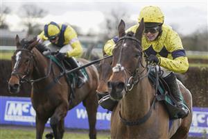 WARWICK, ENGLAND - JANUARY 16: Jonjo O'Neill Jr. riding Sky Pirate (R, yellow) clear the last to win The Edward Courage Cup Handicap Chase at Warwick Racecourse on January 16, 2021 in Warwick, England. Due to the Coronavirus pandemic, owners along with the paying public will not be allowed to attend the meeting. (Photo by Alan Crowhurst/Getty Images)