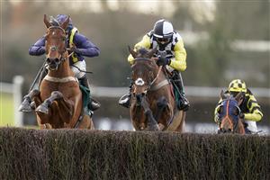 WARWICK, ENGLAND - JANUARY 16: Harry Cobden riding Next Destination (black/white cap) clear the last to win The McCoy Contractors Civils And Infrastructure Hampton Novices' Chase from Jonjo O'Neill Jr. and Fiddlerontheroof (L) at Warwick Racecourse on January 16, 2021 in Warwick, England. Due to the Coronavirus pandemic, owners along with the paying public will not be allowed to attend the meeting. (Photo by Alan Crowhurst/Getty Images)