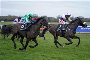 WARWICK, ENGLAND - JANUARY 16: Richard Johnson riding Adrimel (R) clear the last to win The Ballymore Leamington Novices' Hurdle at Warwick Racecourse on January 16, 2021 in Warwick, England. Due to the Coronavirus pandemic, owners along with the paying public will not be allowed to attend the meeting. (Photo by Alan Crowhurst/Getty Images)