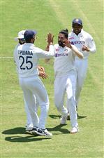 BRISBANE, AUSTRALIA - JANUARY 18: Mohammed Siraj of India celebrates the wicket of Matthew Wade of Australia during day four of the 4th Test Match in the series between Australia and India at The Gabba on January 18, 2021 in Brisbane, Australia. (Photo by Matt Roberts/Getty Images)