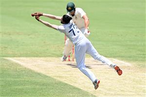 BRISBANE, AUSTRALIA - JANUARY 18: Mohammed Siraj of India fields the ball during day four of the 4th Test Match in the series between Australia and India at The Gabba on January 18, 2021 in Brisbane, Australia. (Photo by Bradley Kanaris/Getty Images)