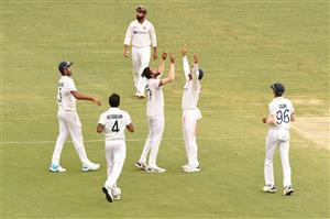 BRISBANE, AUSTRALIA - JANUARY 18: Mohammed Siraj of India celebrates the wicket of Josh Hazlewood of Australia during day four of the 4th Test Match in the series between Australia and India at The Gabba on January 18, 2021 in Brisbane, Australia. (Photo by Matt Roberts/Getty Images)