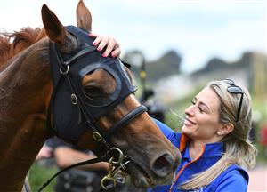 MELBOURNE, AUSTRALIA - JANUARY 16: Over Exposure after winning race 5, the Furphy Refreshing Ale Trophy, during Melbourne Racing at Flemington Racecourse on January 16, 2021 in Melbourne, Australia. (Photo by Vince Caligiuri/Getty Images)