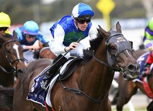 MELBOURNE, AUSTRALIA - JANUARY 16: Will Price riding High 'N' Dry to win Race 2, the Summer Twilight Racing Trophy at Flemington Racecourse on January 16, 2021. (Getty)