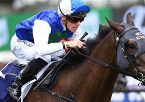 MELBOURNE, AUSTRALIA - JANUARY 16: Will Price riding High 'N' Dry to win Race 2, the Summer Twilight Racing Trophy at Flemington Racecourse on January 16, 2021. (Getty)
