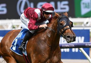 MELBOURNE, AUSTRALIA - JANUARY 16: Damian Lane riding Over Exposure to win race 5, the Furphy Refreshing Ale Trophy, during Melbourne Racing at Flemington Racecourse on January 16, 2021 in Melbourne, Australia. (Photo by Vince Caligiuri/Getty Images)
