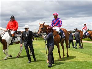 MELBOURNE, AUSTRALIA - JANUARY 16: Damien Oliver after riding Absolute Flirt to win Race 3, the Polytrack Handicap, during Melbourne Racing at Flemington Racecourse on January 16, 2021 in Melbourne, Australia. (Photo by Vince Caligiuri/Getty Images)
