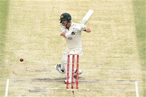 BRISBANE, AUSTRALIA - JANUARY 18: David Warner of Australia bats during day four of the 4th Test Match in the series between Australia and India at The Gabba on January 18, 2021 in Brisbane, Australia. (Photo by Matt Roberts/Getty Images)