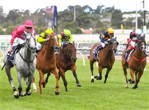 MELBOURNE, AUSTRALIA - JANUARY 16: Jordan Childs riding Fabergino wins Race 7, the Kensington Stakes, during Melbourne Racing at Flemington Racecourse on January 16, 2021 in Melbourne, Australia. (Photo by Vince Caligiuri/Getty Images)