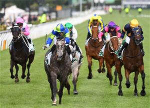 MELBOURNE, AUSTRALIA - JANUARY 16: Jye McNeil riding Housay to win Race 9, the Tab Venue Mode Handicap, during Melbourne Racing at Flemington Racecourse on January 16, 2021 in Melbourne, Australia. (Photo by Vince Caligiuri/Getty Images)